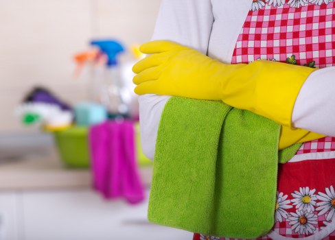 Local cleaner working in a Sutton kitchen and bathroom