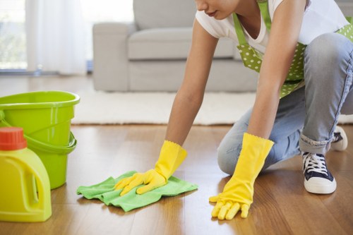 Detailed post-construction cleaning of kitchen surfaces and fixtures in Sutton